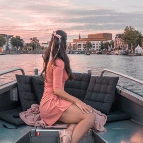 Looking for a great way to see Amsterdam? Rent a canal boat! Affordable, fun, and a great story for your Amsterdam travels!